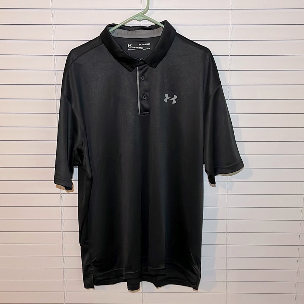 Brand new-never worn. Under Armour golf polo